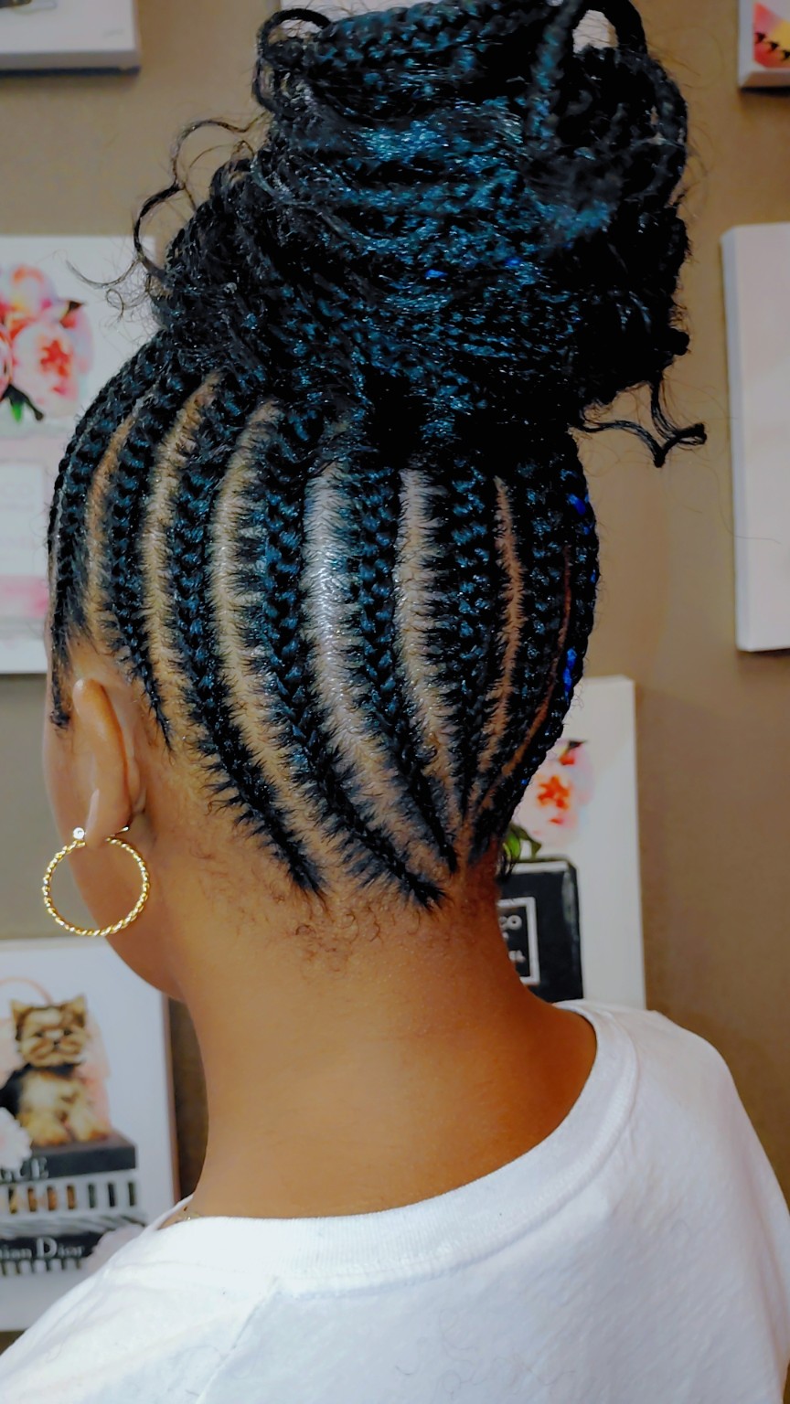Detailed braided updo viewed from the side